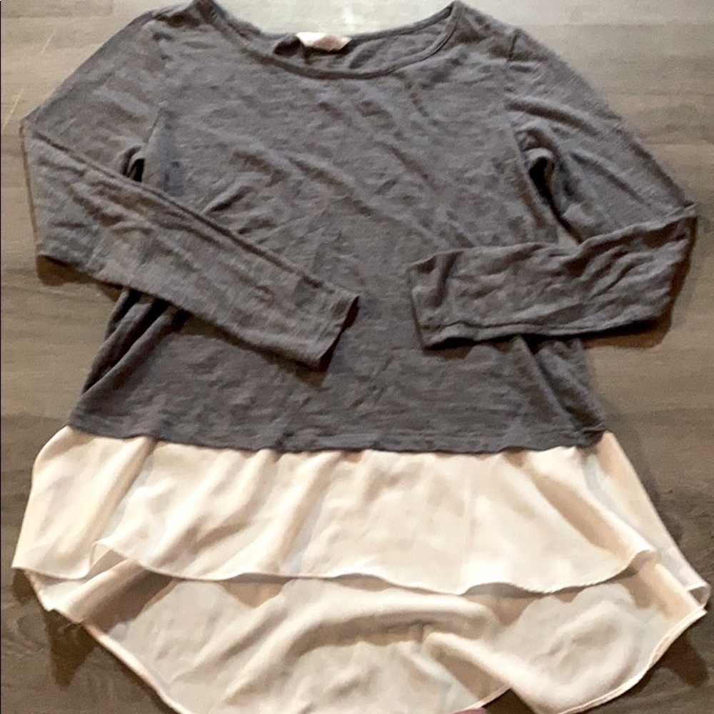 Nice blouse with white sheer material at bottom